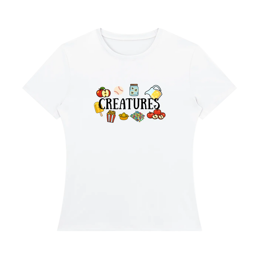 A white short-sleeve crewneck t-shirt featuring a colorful graphic on the chest with the word 'CREATURES' and small cartoon illustrations, shown against a plain white background.